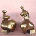 SEATED 8 AND 9 (small)  size (each): 10" x 7" x 5"  weight (each): 10 lbs  cast bronze