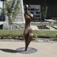 STROLLING WOMAN 3 (large)    size: 72" x 24" x 18"    weight: 240 lbs    cast bronze